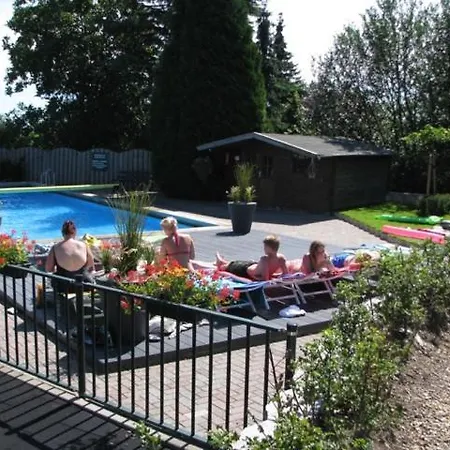 Boomstamhuis High Chaparral * Oorsbeek