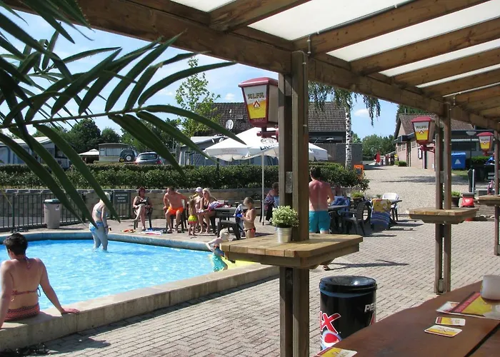 Boomstamhuis High Chaparral Village de vacances Oorsbeek